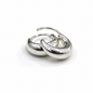 A pair of polished silver huggie hoop earrings with a smooth, curved, organic design, displayed on a clean white background.