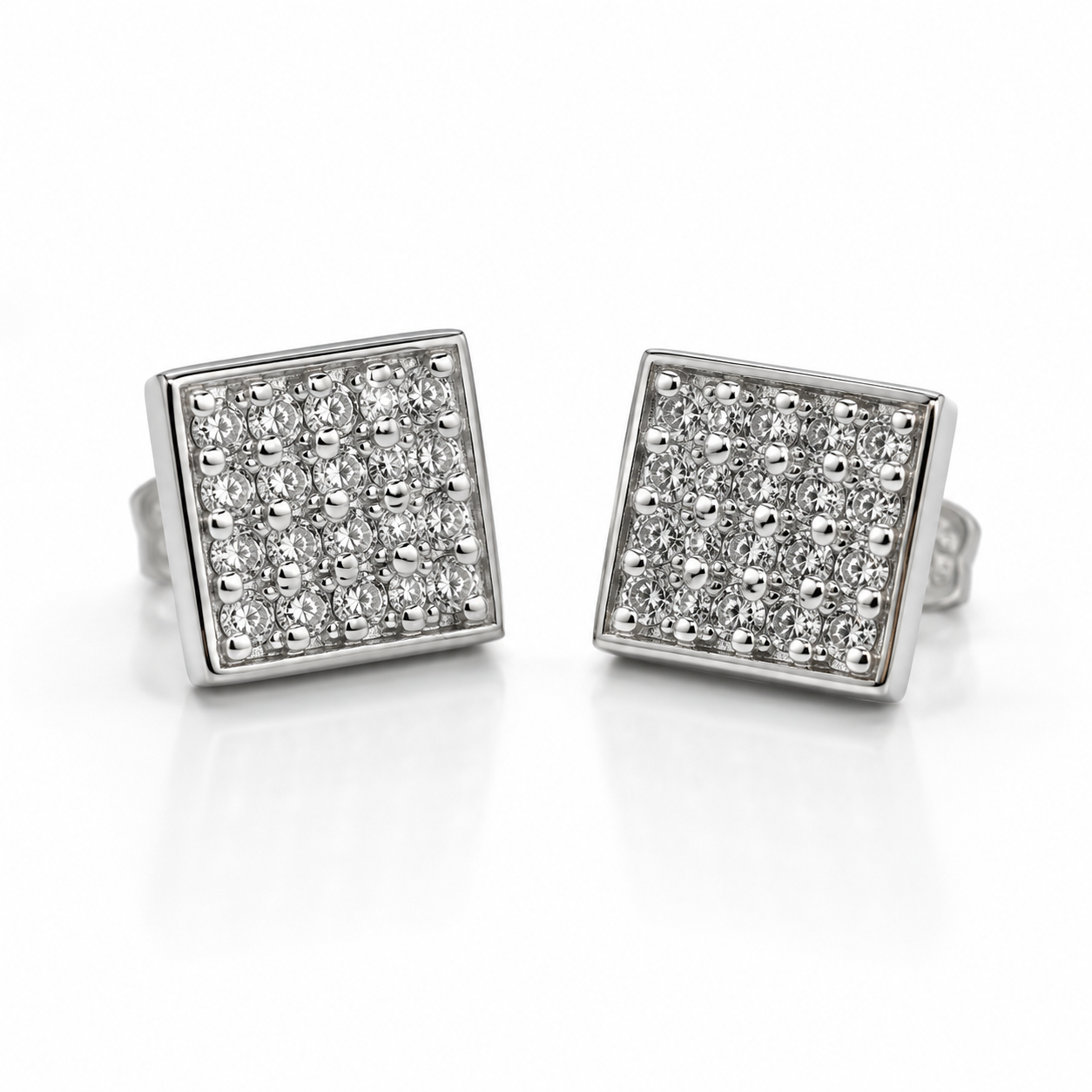 A pair of square stud earrings with pavé-set clear stones in a silver-tone frame, displayed on a clean white background.